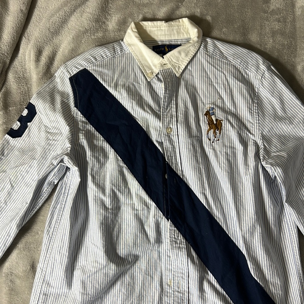 Polo button down collar shirt.